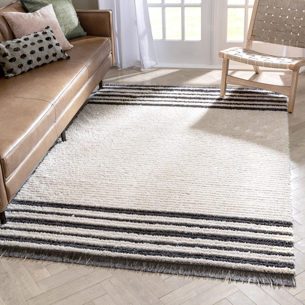 Adriel Tribal Solid Border Pattern Ivory Textured Pile Rug